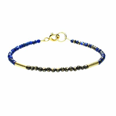 Handmade bracelet with natural, spherical shaped lapis lazulis and pyrite gemstones and decorative elements made of gold plated sterling silver.