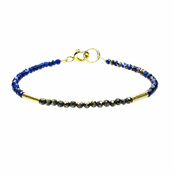Handmade bracelet with natural, spherical shaped lapis lazulis and pyrite gemstones and decorative elements made of gold plated sterling silver.