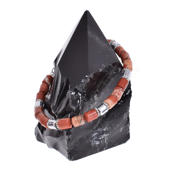 Handmade bracelet with natural jasper and hematite gemstones, in a cylindrical shape. The bracelet has magnetic clasp made of steel and decorative elements made of sterling silver. Buy online shop.