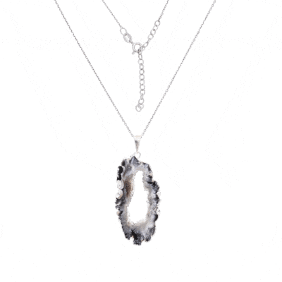 Pendant made of natural agate gemstone with crystal quartz and hypoallergenic silver plated metal. The agate is polished on both sides and the pendant is threaded on a sterling silver chain with adjustable length. Buy online shop.