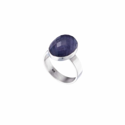 Handmade ring made of sterling silver with doublet of Crystal quartz and Iolite in oval shape. The doublet consists of two layers of stones. The upper stone is Crystal Quartz and the stone at the bottom is Iolite. Buy online shop.