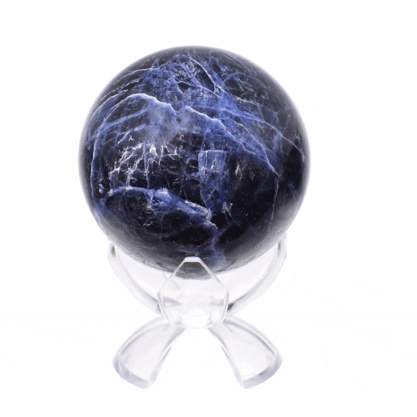 Polished 6.5cm diameter sphere made from natural sodalite gemstone. The sphere comes with a transparent plexiglass base. Buy online shop.