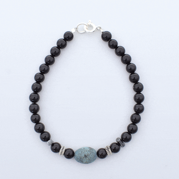 Handmade bracelet with natural spherical shaped onyx and oval shaped chrysocolla gemstones, decorated with elements made of sterling silver. Buy online shop.