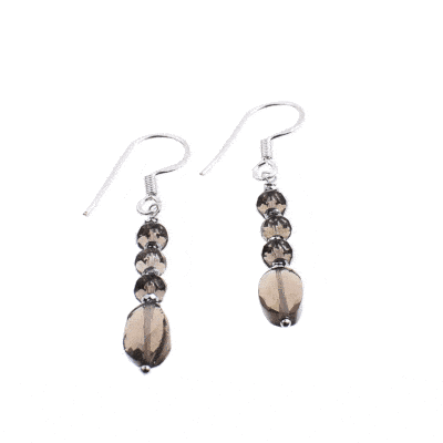Handmade long earrings made of sterling silver and natural, faceted smoky quartz and hematite gemstones, in an oval and wheel shape. Buy online shop.