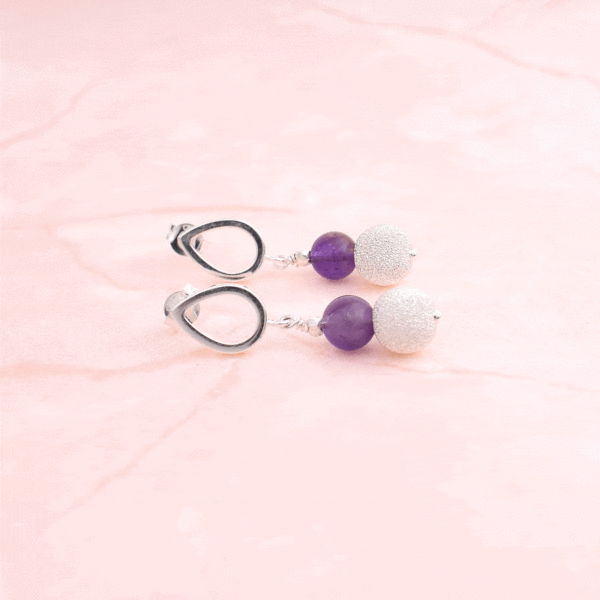 Handmade, long earrings made of sterling silver and natural amethyst gemstone.