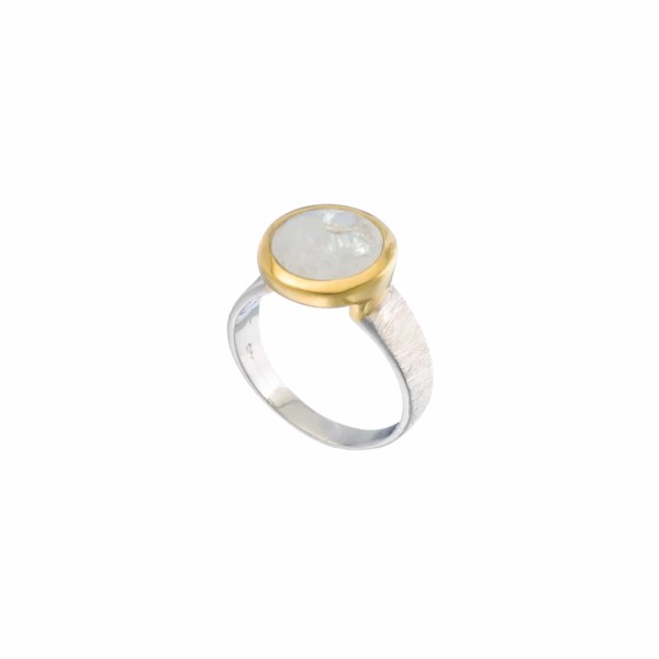Ring made of sterling silver and white Labradorite in round shape. The surface on the band of the ring is textured and the outline of the bezel is gold plated sterling silver. Buy online shop.