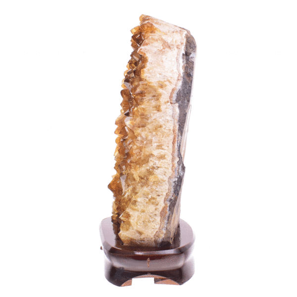 Raw piece of natural citrine quartz gemstone, placed on a wooden base. The stone has a height of 22cm. Buy online shop.