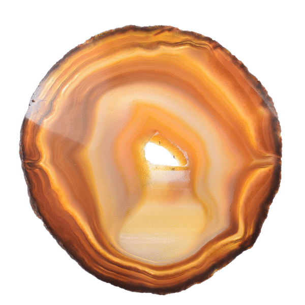Polished slice of natural agate gemstone with crystal quartz. The Agate has a size of 12.5cm. Buy online shop.