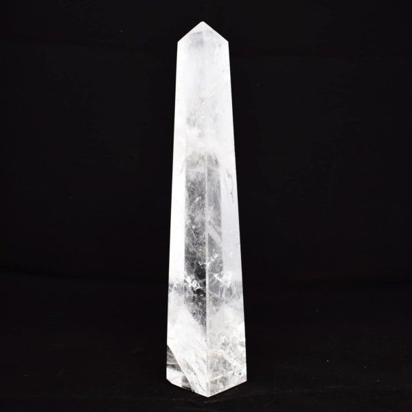 Obelisk made of natural crystal quartz gemstone, with a height of 25cm. Buy online shop.