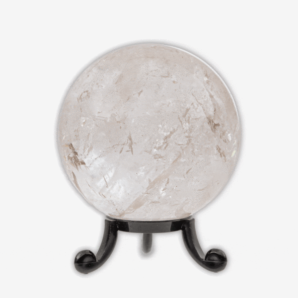 Polished 6.5cm diameter sphere made from natural  crystal quartz. The sphere comes with a black plexiglass base. Buy online shop.