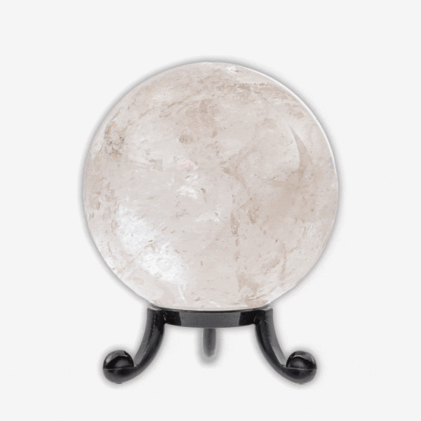 Polished 6.5cm diameter sphere made from natural  crystal quartz. The sphere comes with a black plexiglass base. Buy online shop.