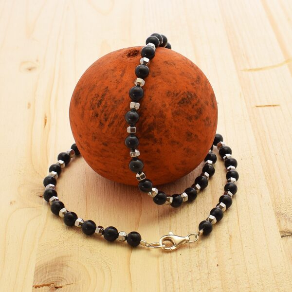 Handmade necklace with natural Dumortierite and Hematite gemstones and clasp made of stering silver. Buy online shop.