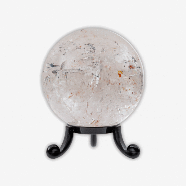 Polished 6cm diameter sphere made from natural crystal quartz. The sphere comes with a black plexiglass base. Buy online shop.