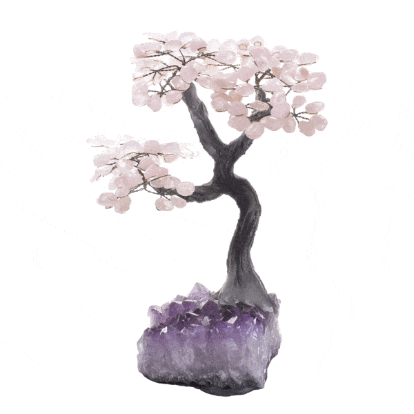 Handmade tree with polished leaves made of Rose Quartz and raw Amethyst base, with a height of 33cm. Buy online shop.