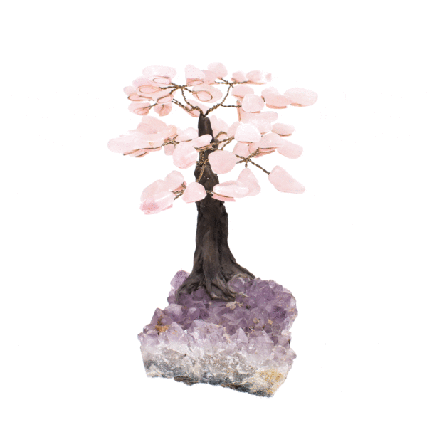 Handmade tree with leaves of natural baroque rose quartz gemstones and natural amethyst base. The tree has a height of 17cm. 