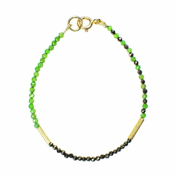 Handmade bracelet with natural, faceted diopside and pyrite stones in a spherical shape. The bracelet has decorative elements and clasp made of gold plated sterling silver. Buy online shop.