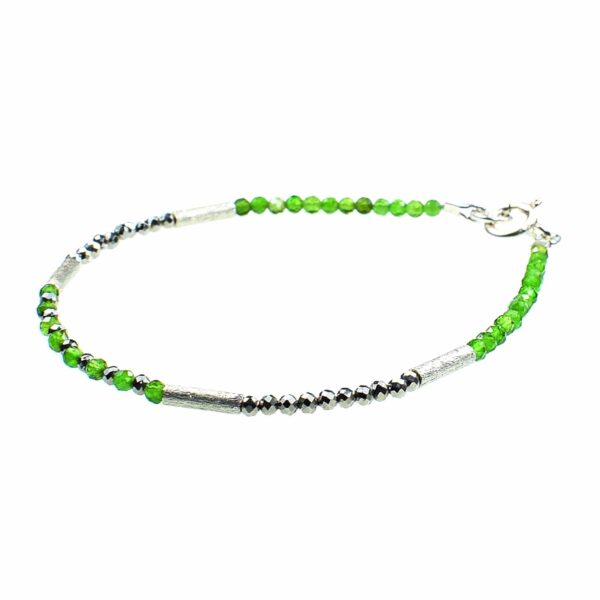 Handmade bracelet with natural, faceted diopside and pyrite stones in a spherical shape. The bracelet has decorative elements and clasp made of sterling silver. Buy online shop.