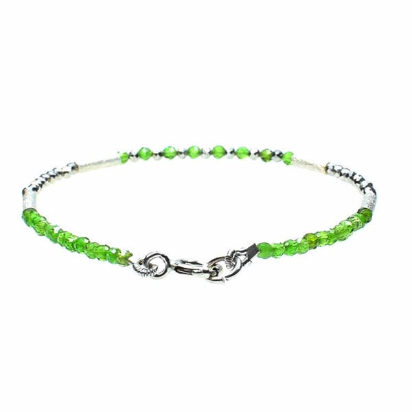 Handmade bracelet with natural, faceted diopside and pyrite stones in a spherical shape. The bracelet has decorative elements and clasp made of sterling silver. Buy online shop.