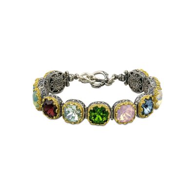 Handmade bracelet made of sterling silver with gold plated details and multicolor crystals. Buy online shop.