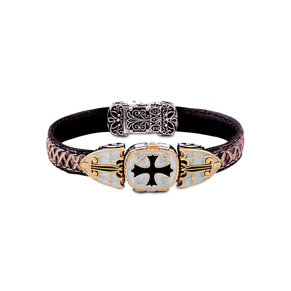 Handmade Byzantine style bracelet made of black leather and sterling silver with gold plated details. A black cross is designed in the center of the bracelet. Buy online shop.