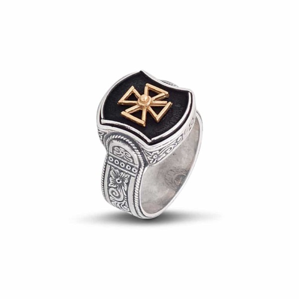 Handmade ring made of sterling silver with a gold plated sterling silver cross in the center. Buy online shop.