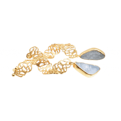Handmade, long earrings made of gold plated sterling silver and natural aquamarine gemstone in a rough form.