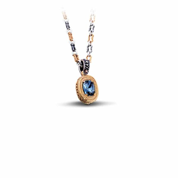 Handmade reversible pendant made of sterling silver with gold plated details, blue crystal and gemstone. The pendant is threaded on a tricolor chain. Buy online shop.