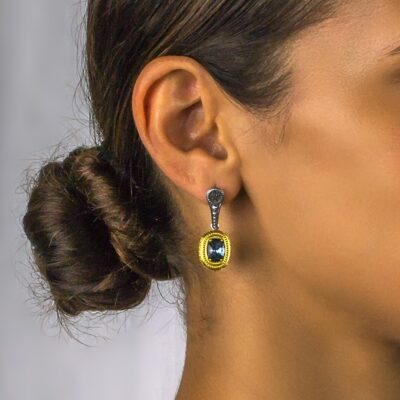 Handmade reversible earrings made of sterling silver with gold plated details, crystals and semi precious gemstones. Buy online shop.