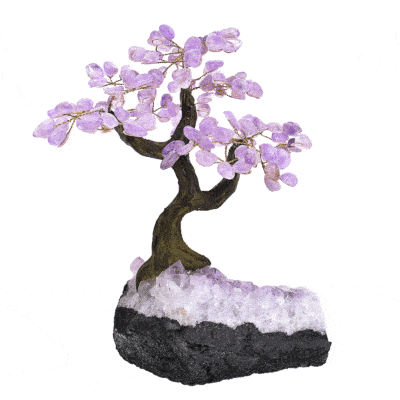 Handmade tree with natural polished amethyst gemstone leaves and raw amethyst base. The tree has a height of 25cm. Buy online shop.