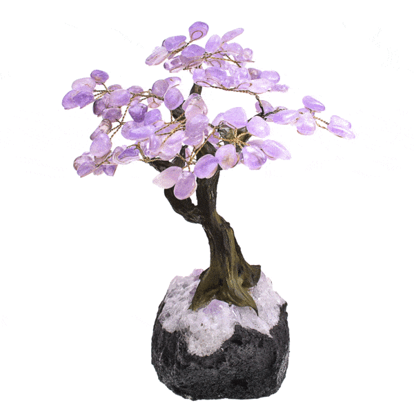 Handmade tree with natural polished amethyst gemstone leaves and raw amethyst base. The tree has a height of 25cm. Buy online shop.