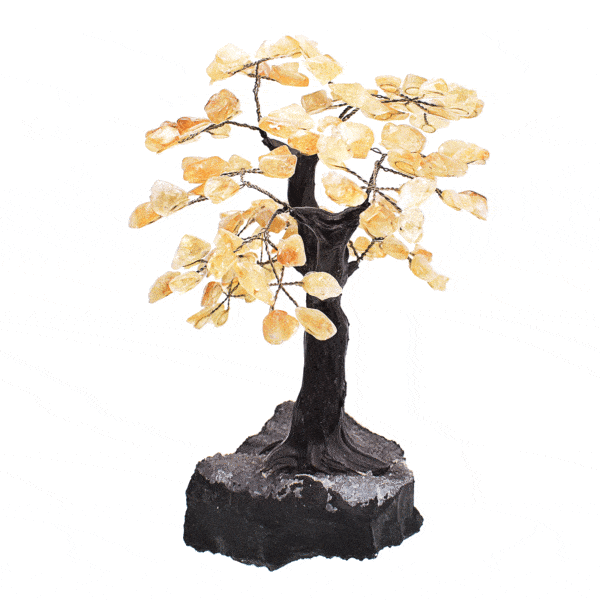 Handmade tree with polished leaves made of natural citrine quartz gemstone and raw amethyst gemstone base. The tree has a height of 24cm. Buy online shop.