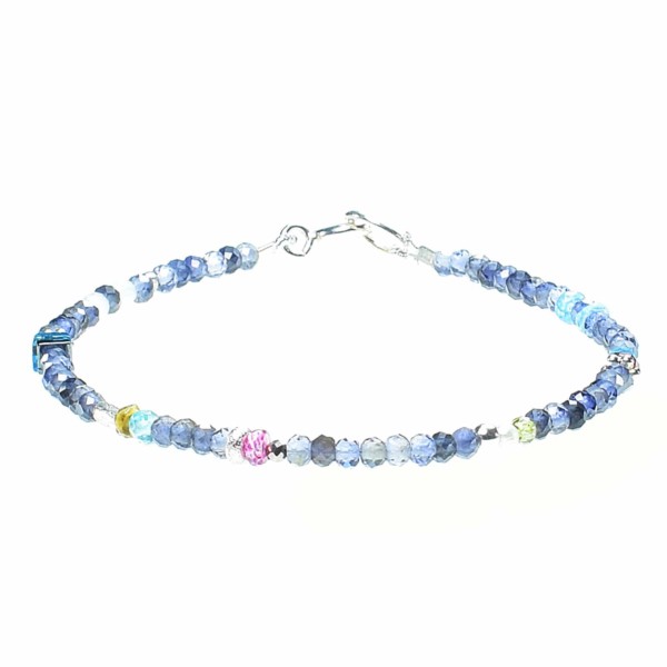 Handmade bracelet made of Iolite and other semi-precious stones. The bracelet is decorated with sterling silver elements. Buy online shop.