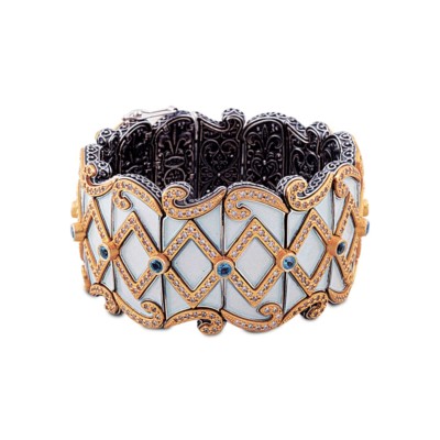 Handmade bracelet made of sterling silver with gold plated details, enamel, Swiss blue topaz and zircons. Buy online shop.