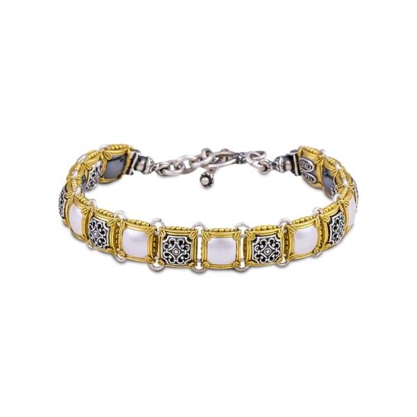 Handmade reversible bracelet made of sterling silver with gold plated details and crystals. Buy online shop.