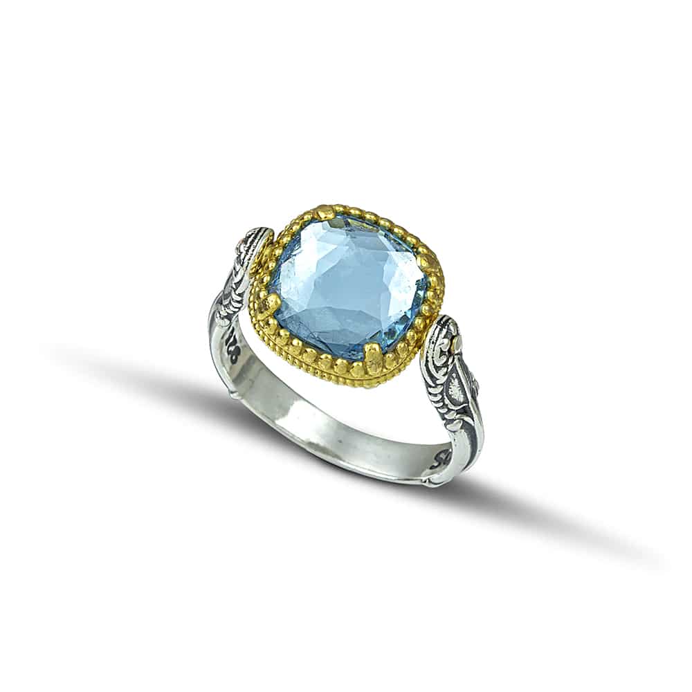 Χειροποίητο δαχτυλίδι διπλής όψης από ασήμι 925 με επιχρυσωμένες λεπτομέρειες, μπλε κρύσταλλo και φίλντισι. Μία όμορφη δημιουργία από Έλληνα σχεδιαστή!