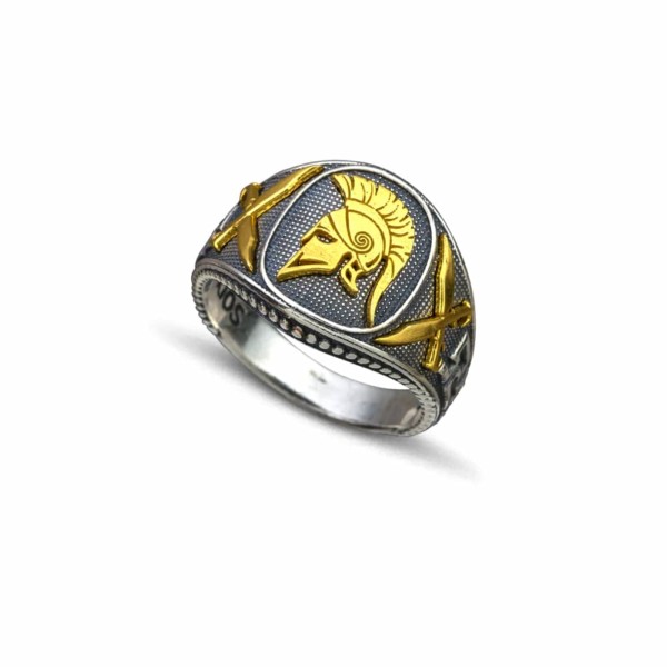 Handmade ring of ancient Greek style, made of sterling silver with gold plated details and a gold plated helmet, as a central element.