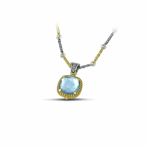 Handmade reversible pendant made of sterling silver with gold plated details, crystals and mother of pearl. The pendant is threaded on a sterling silver tricolor chain. Buy online shop.