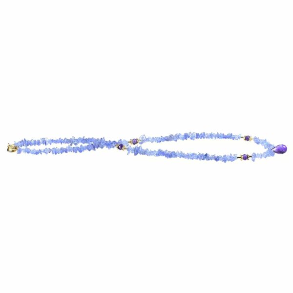 Handmade necklace made of Tanzanite chips and Amethyst, decorated with gold plated sterling silver elements and an Amethyst drop, as a central element. Buy online shop.