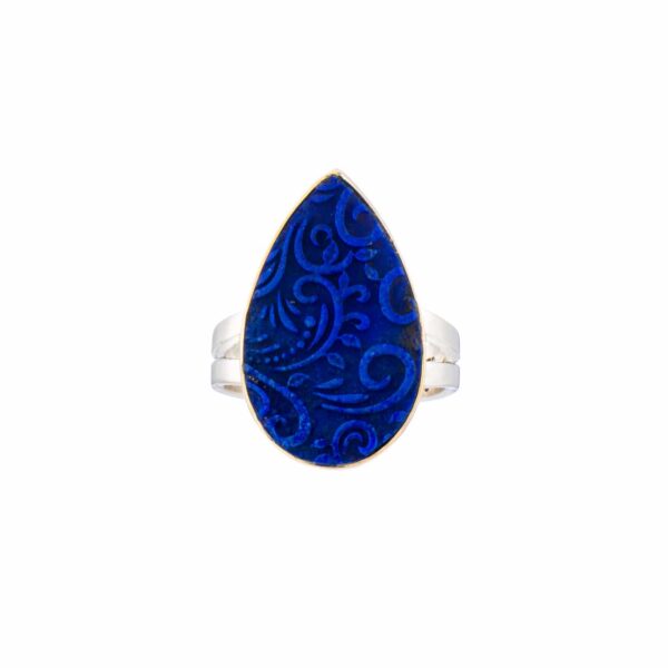 Handmade silver and gold ring with carved Lapis Lazuli stone, in a tear-drop shape. The band of the ring is made of sterling silver and the outline of the bezel is made of 18 carats gold. Buy online shop.