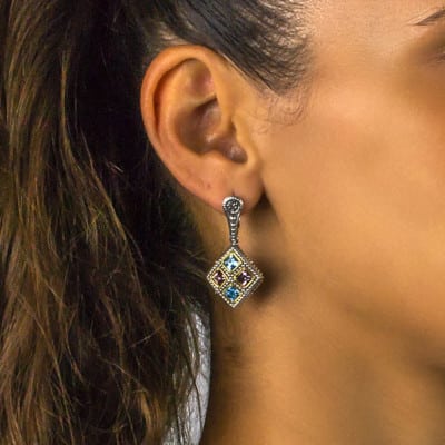 Handmade earrings in rhombus shape, made of sterling silver with gold plated details and multi color crystals. Buy online shop.