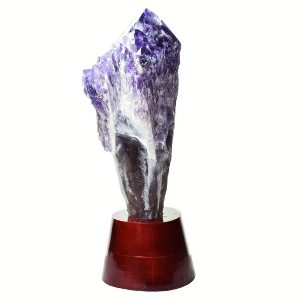 Raw amethyst flame, placed on a wooden base, with a height of 39cm. Buy online shop.