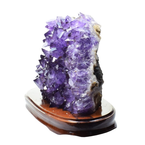 Raw piece of amethyst, placed on a wooden base, with a height of 19cm. Buy online shop.