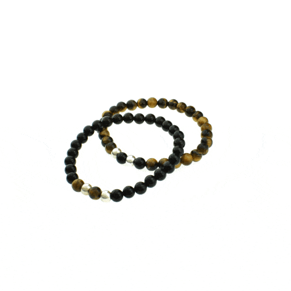 Handmade bracelets with Tiger Eye and Onyx gemstones. The stones are threaded on an extra quality silicone elastic and the bracelets are decorated with sterling silver elements. Buy online shop.