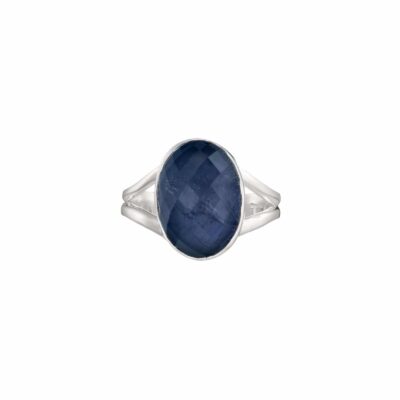 Handmade ring made of sterling silver and doublet made of iolite and crystal quartz in an oval shape. The doublet consists  of two layers of stones.The upper stone is crystal quartz and the stone at the bottom is iolite. Buy online shop.