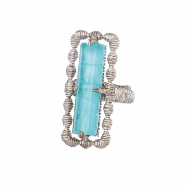 Handmade ring made of sterling silver and doublet made of aquamarine and crystal quartz, in a parallelogram shape. The doublet consists  of two layers of stones.The upper stone is crystal quartz and the stone at the bottom is aquamarine. Buy online shop.