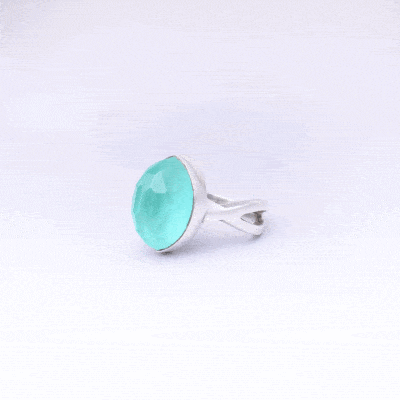 Handmade sterling silver ring with doublet made of natural chalcedony and crystal quartz gemstones, in a marquise shape. The doublet consists of two layers of stones.The upper stone is crystal quartz and the stone at the bottom is chalcedony. Buy online shop.