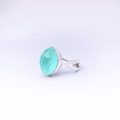 Handmade sterling silver ring with doublet made of natural chalcedony and crystal quartz gemstones, in a marquise shape. The doublet consists of two layers of stones.The upper stone is crystal quartz and the stone at the bottom is chalcedony. Buy online shop.