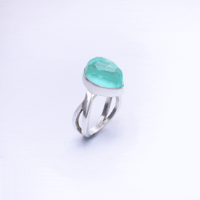 Handmade sterling silver ring with doublet made of natural chalcedony and crystal quartz gemstones, in a marquise shape. The doublet consists of two layers of stones.The upper stone is crystal quartz and the stone at the bottom is chalcedony. Buy online shop.