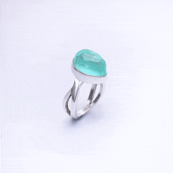 Handmade sterling silver ring with doublet made of natural chalcedony and crystal quartz gemstones, in a marquise shape. The doublet consists of two layers of stones.The upper stone is crystal quartz and the stone at the bottom is chalcedony. Buy online shop.