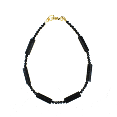 Handmade bracelet with natural Onyx and Spinel gemstones and clasp made of gold plated sterling silver. Buy online shop.